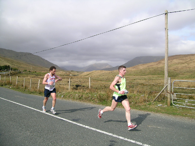 Shane Boyle leads Simone Grassi in the full marathon at mile fourteen....but not for long!