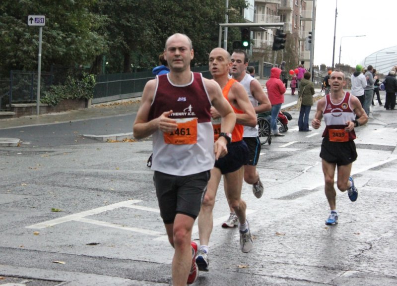 Anthony Devany (Mayo AC) strides ahead of Mark Davis (Craughwell AC) to win third place