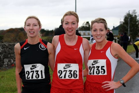 Hollymount 3k: l-r Caroline Clancy (Loughrea AC) 3rd, winner Catherine Conway (Mayo AC) and Regina Casey (GCH) 2nd.