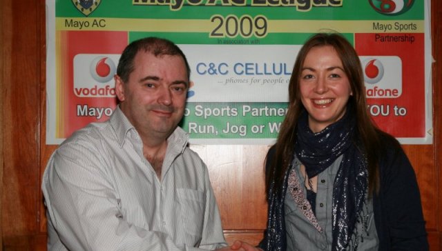Brendan Chambers and Catherine Conway:Westport 5k 7th feb 2010 056.JPG Brendan Chambers Vodafone C&C Cellular presenting prize to Catherine Conway winner 2009 Mayo AC